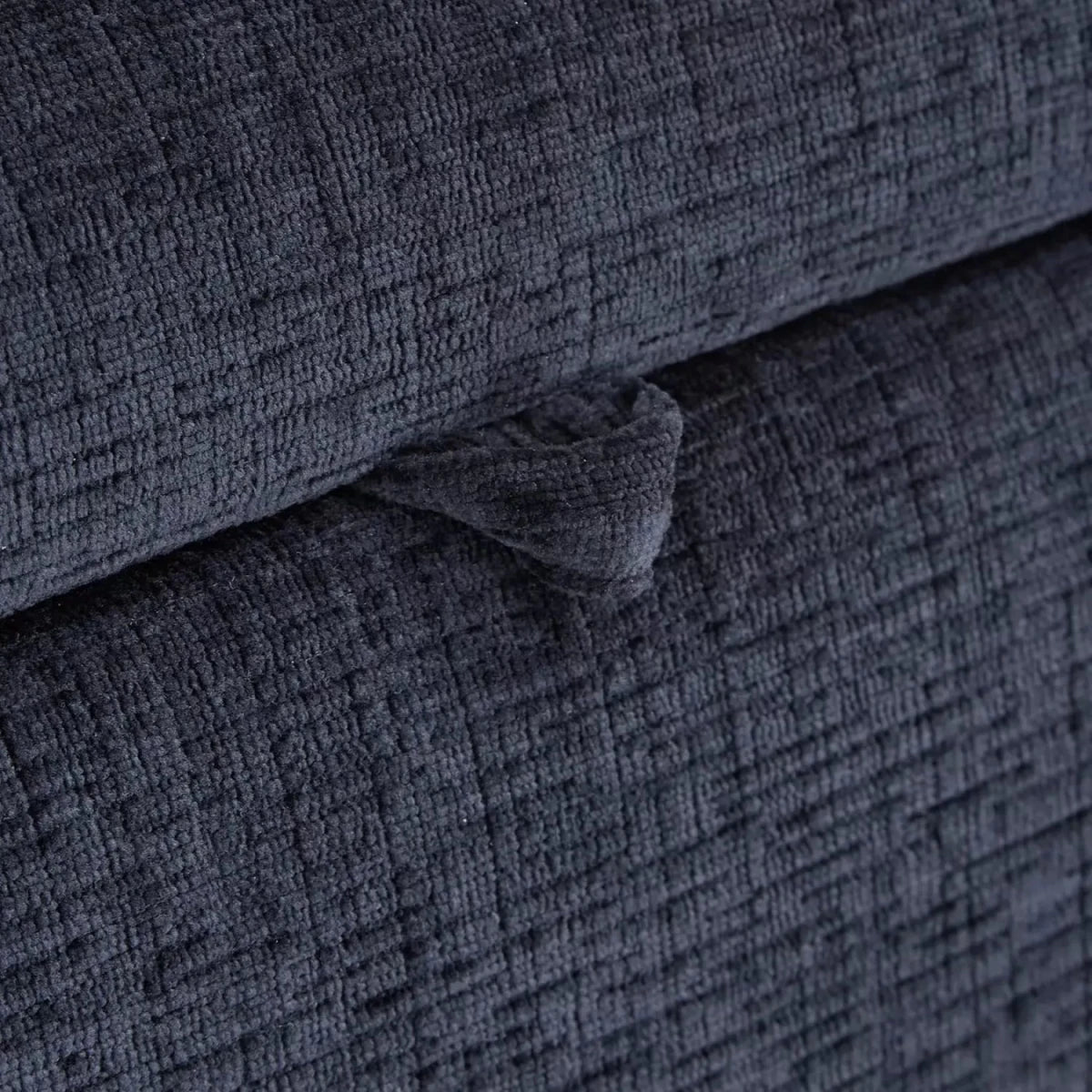 Luxurious chenille fabric upholstery with soft and rich texture.