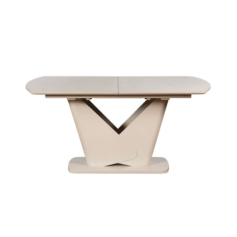 Varello cream sintered stone extending dining table with butterfly leaf and sculptural base. 