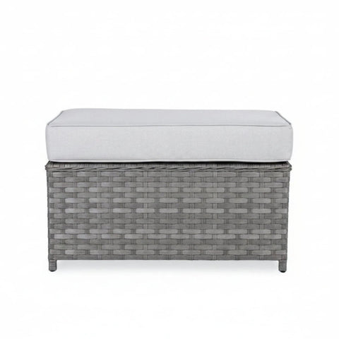 Matching outdoor bench with cushioned seating and modern design.