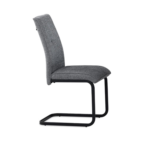 Side view of Venezia Dark gray upholstered dining chairs with black cantilever black metal base