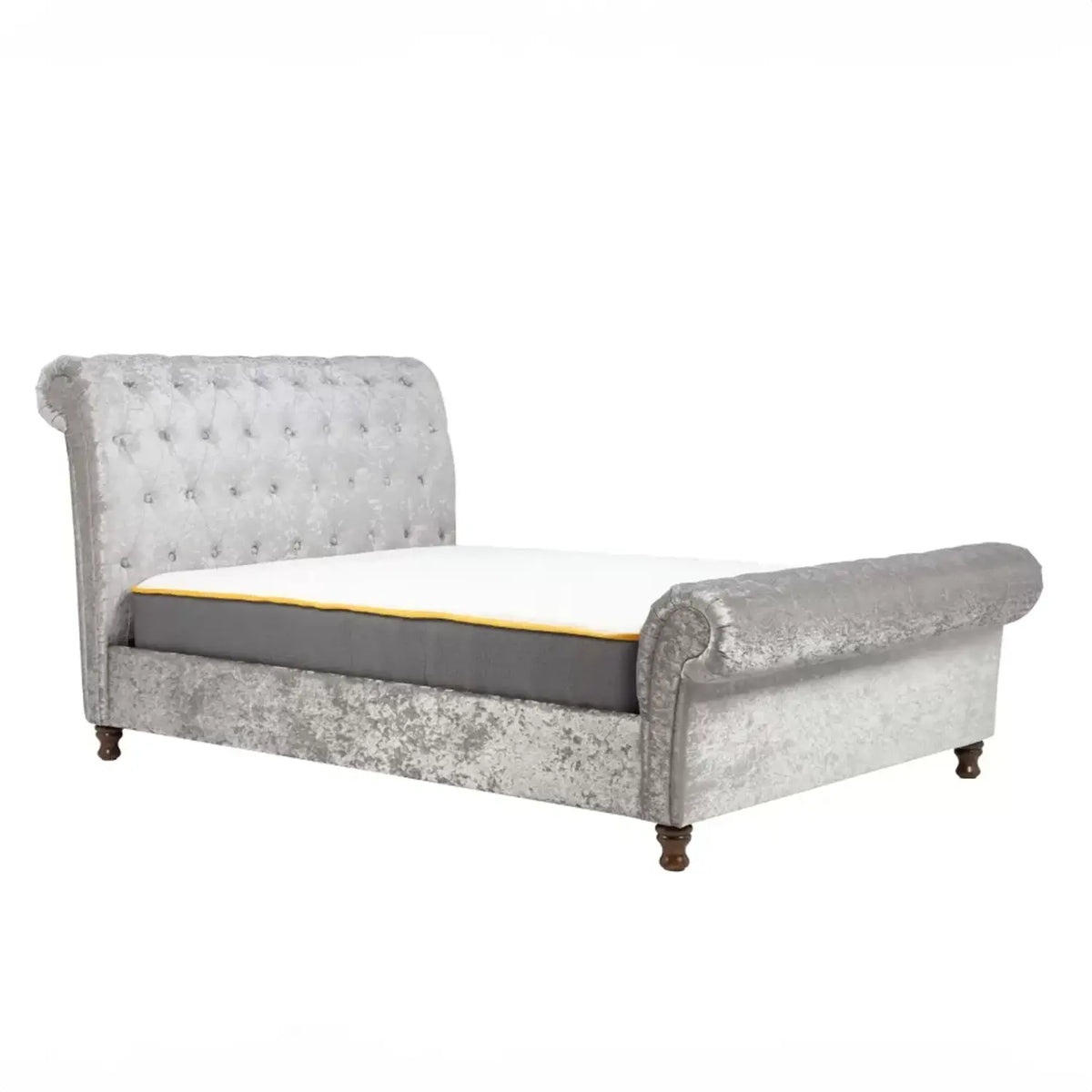 Venice Bed: A chic statement piece with stylish buttoned detailing, rolled headboard, and footboard design. Upholstered in polyester, available in steel, charcoal, or grey fabric. Dark rubberwood feet. Versatile options include Double Bed, Small Double Bed, and King Bed sizes - Crush Silver Bed Image