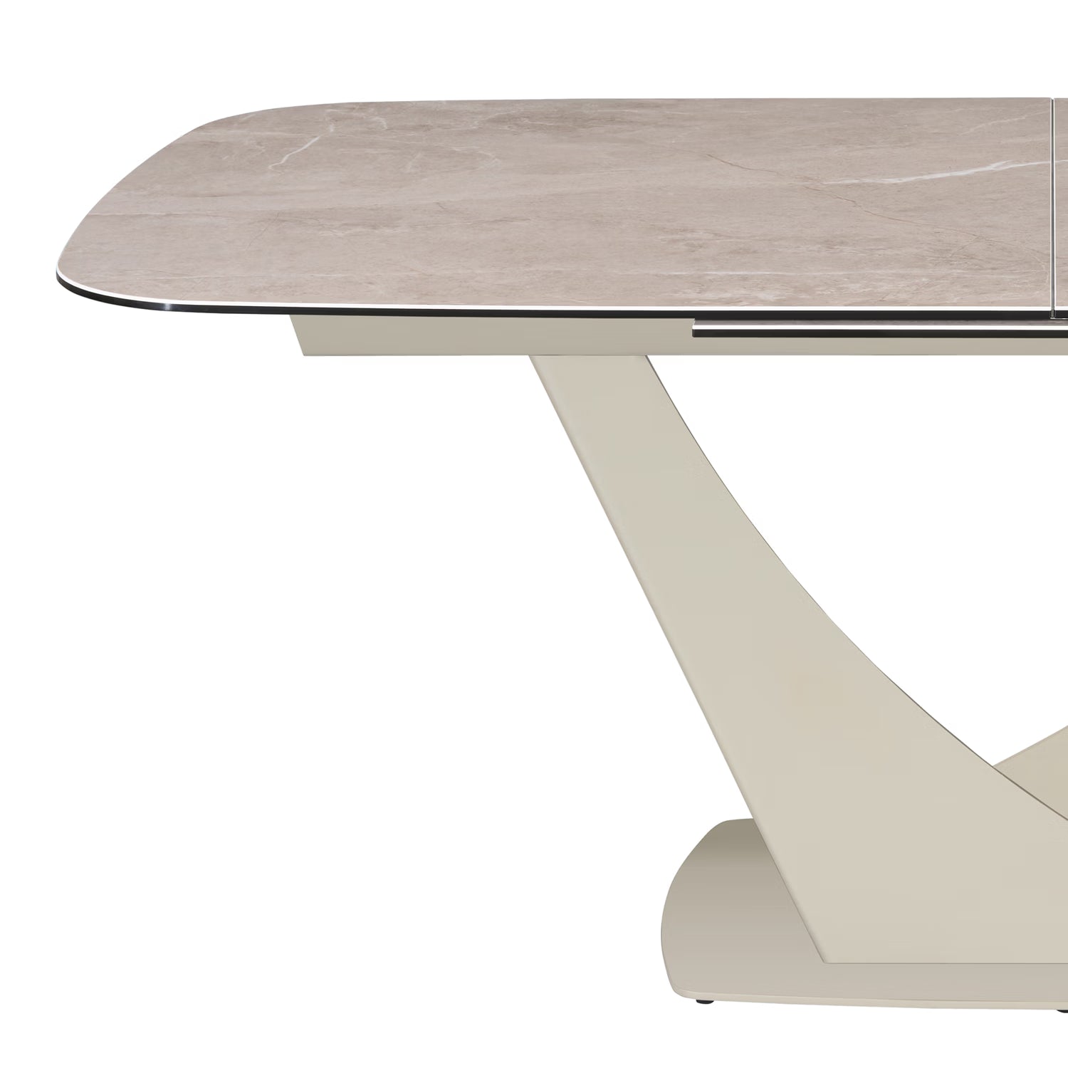 Close-up of a modern dining table showing a light beige marble-look top with rounded corners and a sculptural cream-colored metal base on a white background.