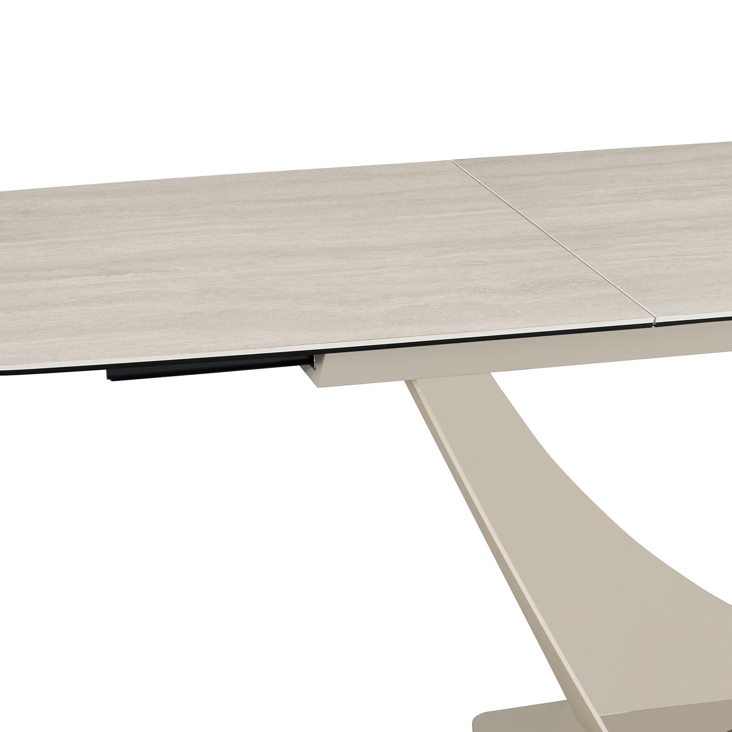 Close-up of a modern extendable dining table with a light beige travertine ceramic  top and a matching sculptural pedestal base on a white background.