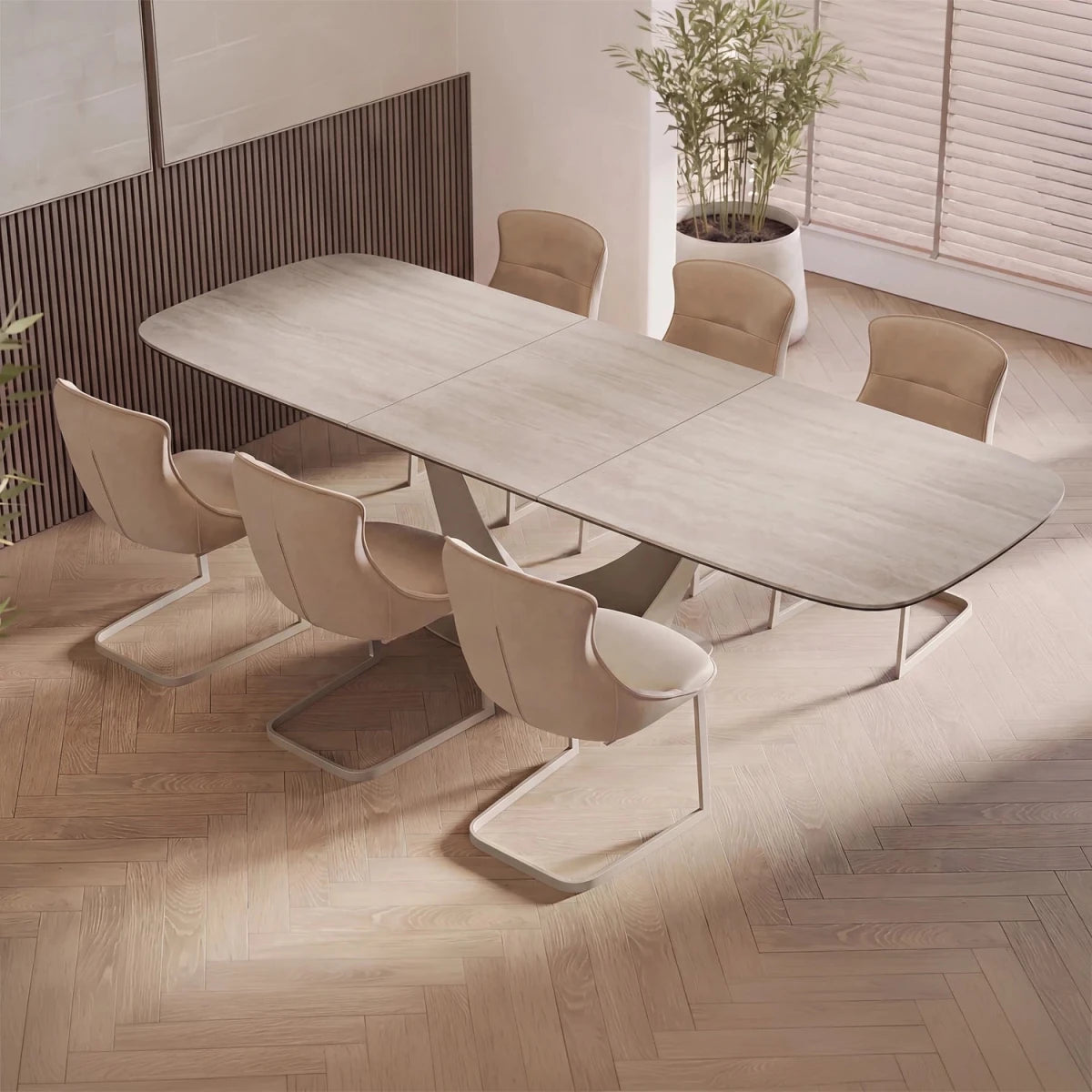 Vita Travertine dining table with heat and scratch resistant ceramic top styled with chairs in a room
