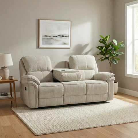 Beige recliner sofa in a living room with a rug, plant, and framed picture on the wall.