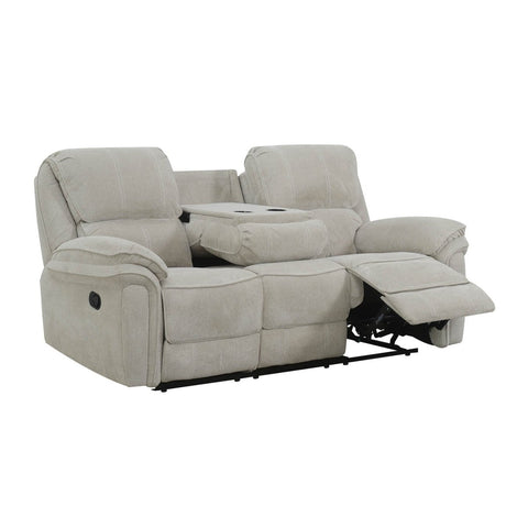 A  beige fabric reclining 3 seater sofa with a centre console table and an extended right footrest, shown on a plain white background.
