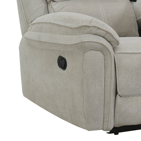 Close-up of a light beige upholstered recliner sofa showing the side armrest, back cushion, and a black power control button on a white background.