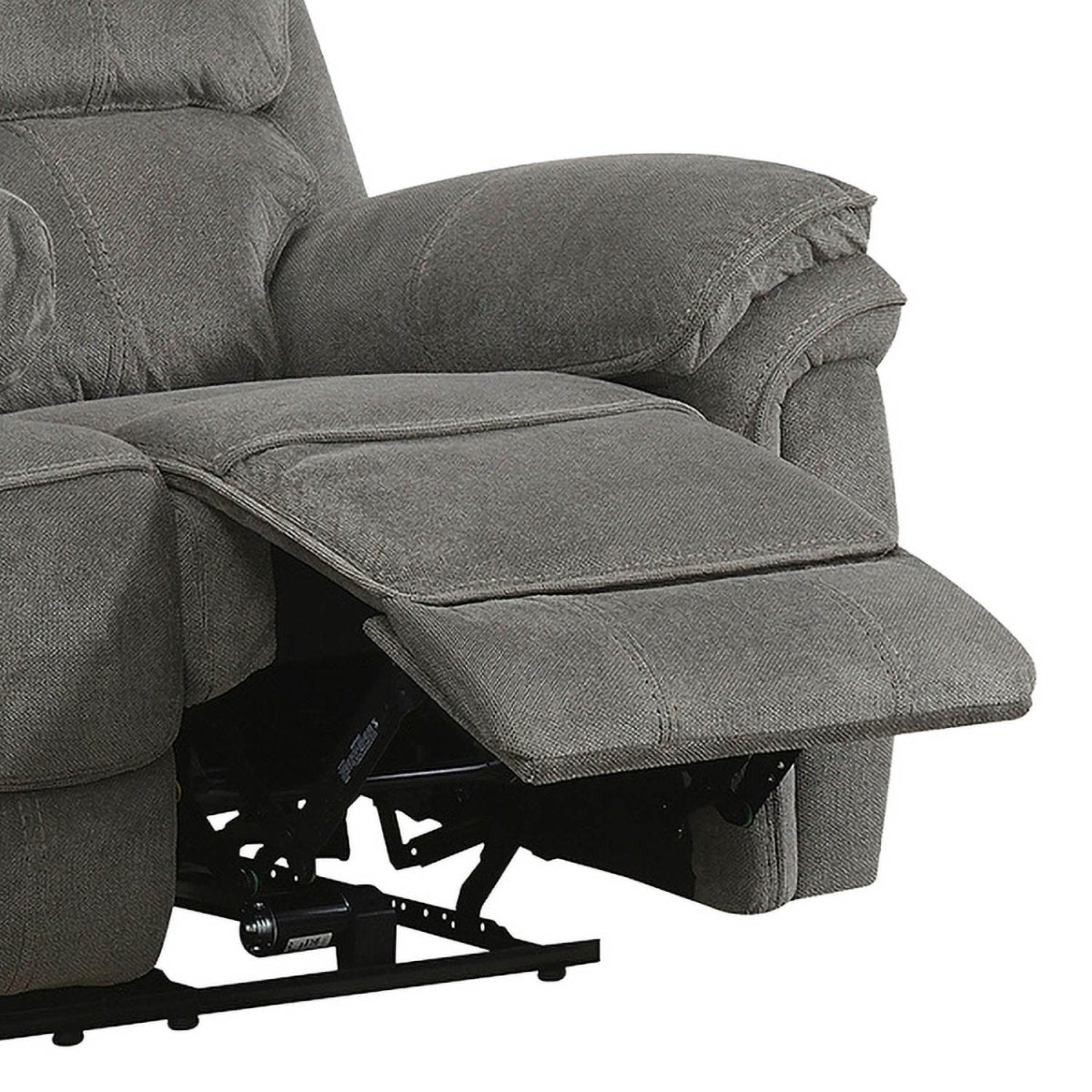 Close-up of a gray upholstered recliner chair with the footrest extended, showing the fabric texture and part of the black mechanical base against a white background.