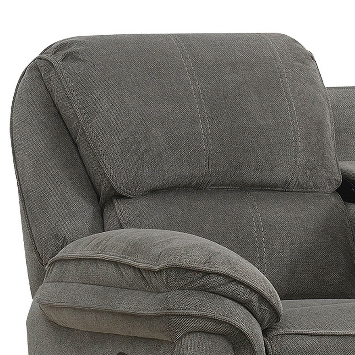 Close-up of a gray upholstered recliner chair showing the backrest cushion, armrest, and fabric texture against a plain white background.
