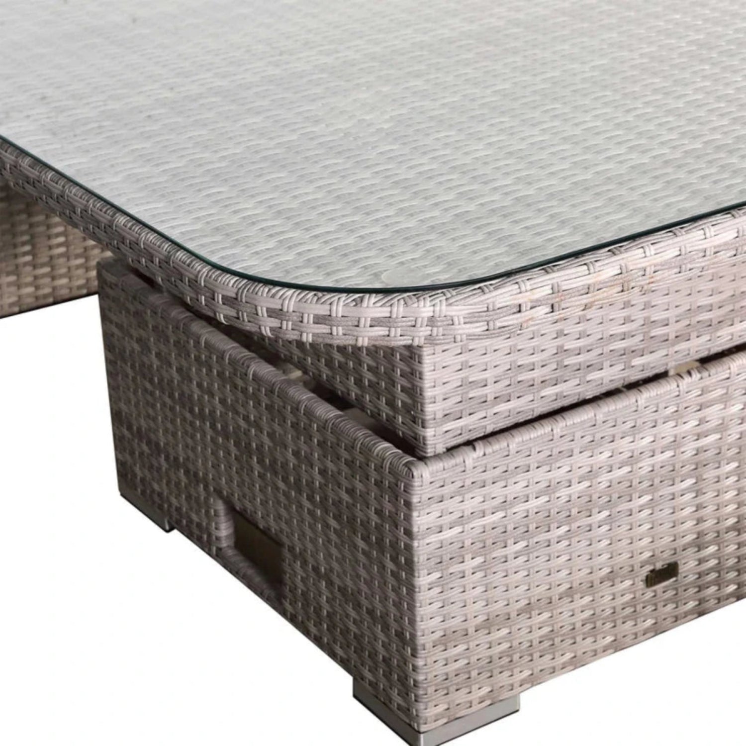 Elegant glass tabletop enhancing patio furniture style.