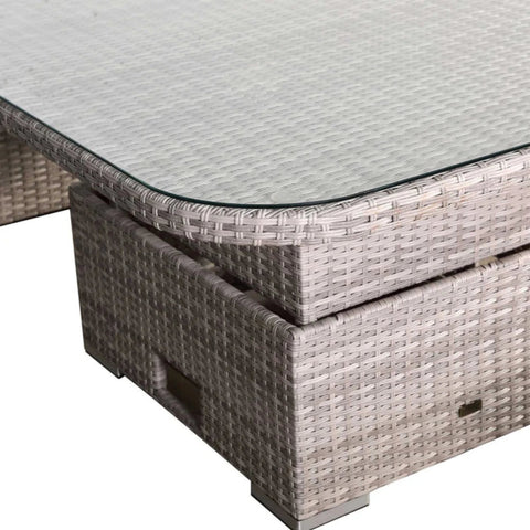 Elegant glass tabletop enhancing patio furniture style.