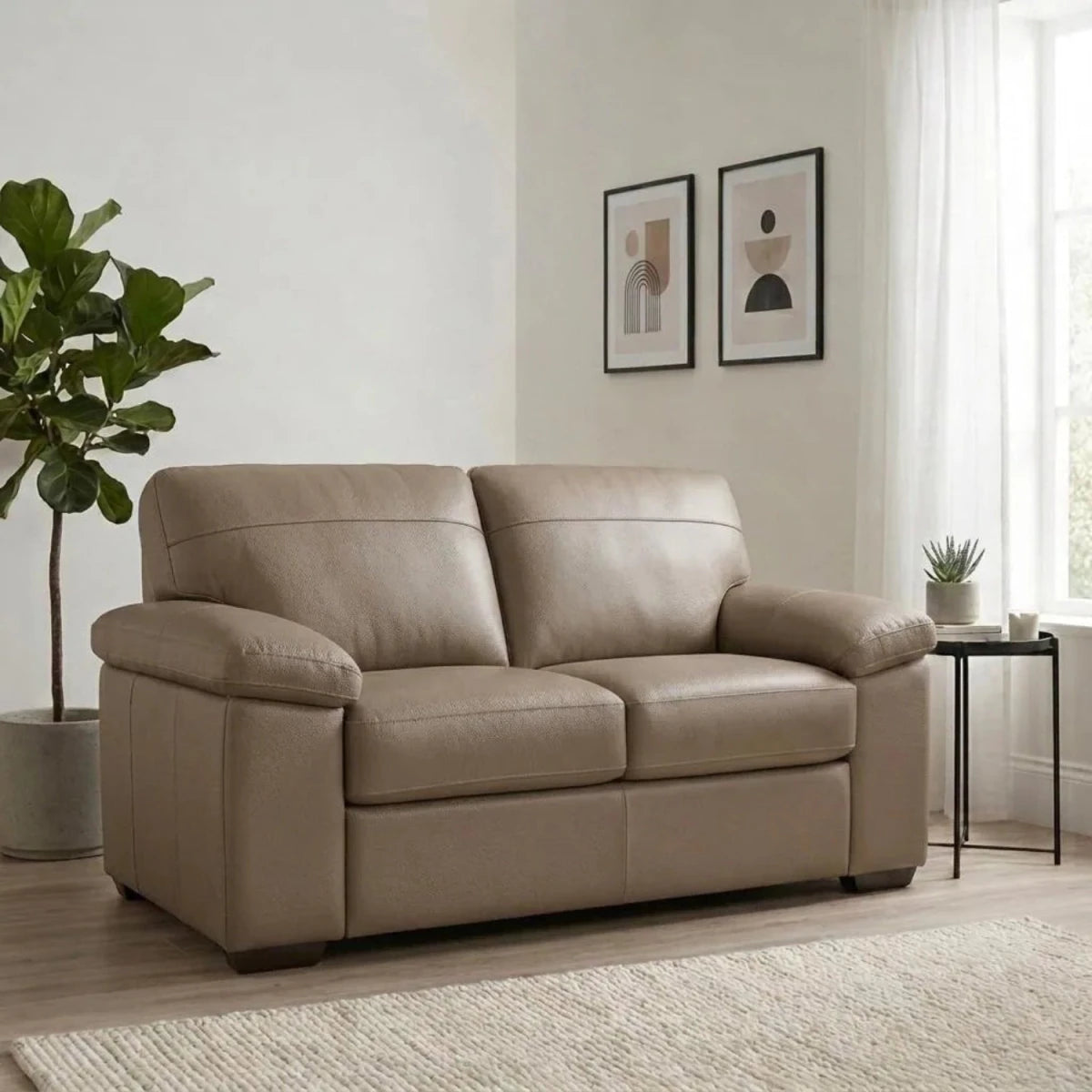 Zuzu Leather Oslo 3 seater sofa with coil sprung foam seating.
