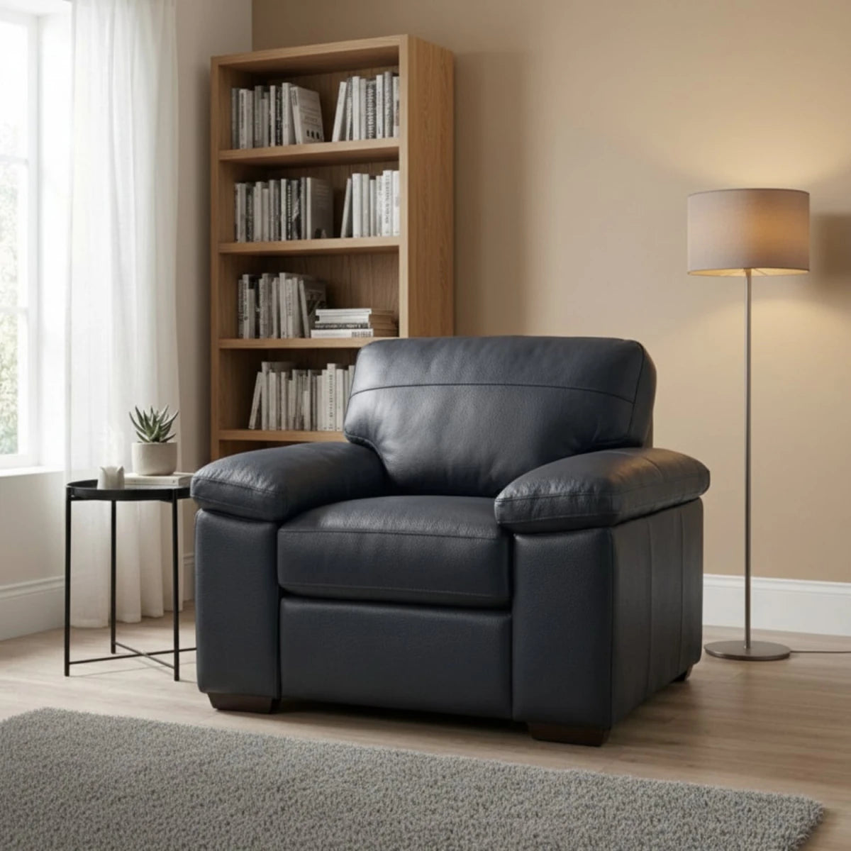 Zuzu Leather Oslo armchair with coil sprung foam seating and modern design.