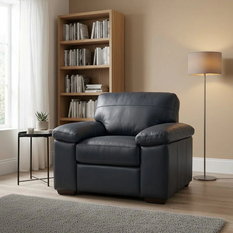Zuzu Leather Oslo armchair with coil sprung foam seating and modern design.