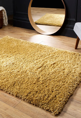 Serene Shaggy Soft Plain Rug, available in Charcoal, Cream, Grey, Gold, Beige, Pink, Red and Sage Green. Available in 5 sizes - Lifestyle Image-Gold